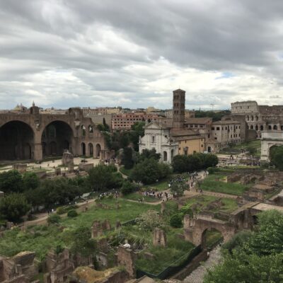 The eastern part of the Forum Archaeological Area (technically not part of the Forum proper). From right to left: the Arch of Titus, the Colosseum, and the Basilica of Maxentius.