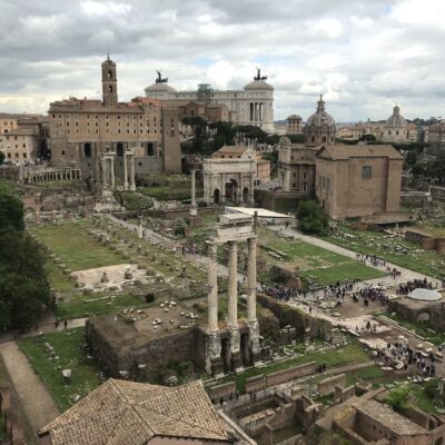 The western part of the Forum Archaeological Area - the Forum proper, and the site of our walking tour. The three columns in the foreground belong to the Temple of Castor and Pollux. The most conspicuous structures in the background are the Curia and Arch of Septimius Severus, both in the right background. 