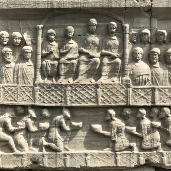 The NW side of the Obelisk's base, showing Theodosius, his two sons, and western emperor Valentinian II receiving homage from barbarians.