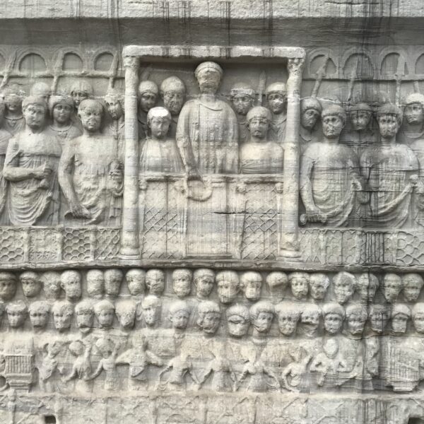 The SE side: Theodosius, flanked by his sons, offers a wreath to the victorious charioteer