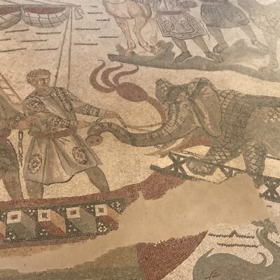 Another Piazza Armernia mosaic showing an elephant being hauled on board.